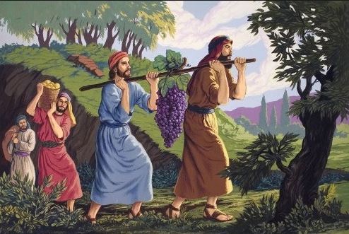 Josué et Caleb portent la grappe de raisins image du sang du rachat